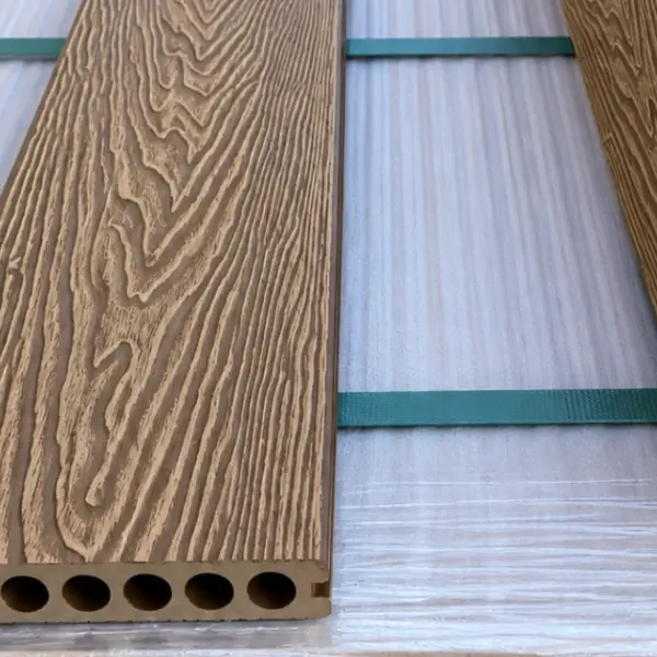 Teak composite decking board — close-up of the wood grain and hollow core